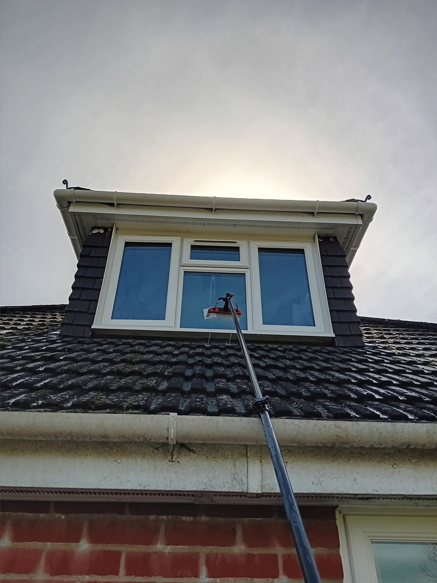 Upstairs dormer window cleaned safely from the ground with reach-and-wash — South Hampshire