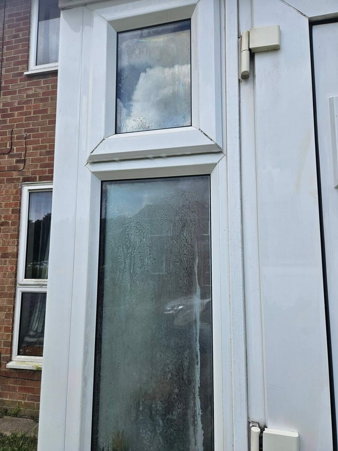 Same UPVC front door and glazing brought back to bright white after a soft UPVC clean